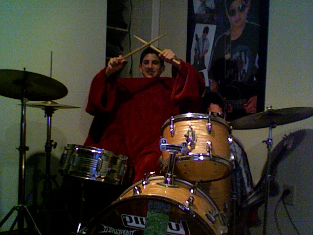 Snuggie Drums - You CANNOT play the drums in a blanket. Snuggies Rock. Everyone bring your complimentary book lights to Michael's next concert.